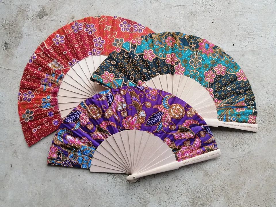 Introducing. Our New Batik Handheld Fans. These Fa..